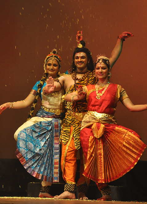 Stage still — Ganga Gowri Vilasam, ensemble in performance, warm wash